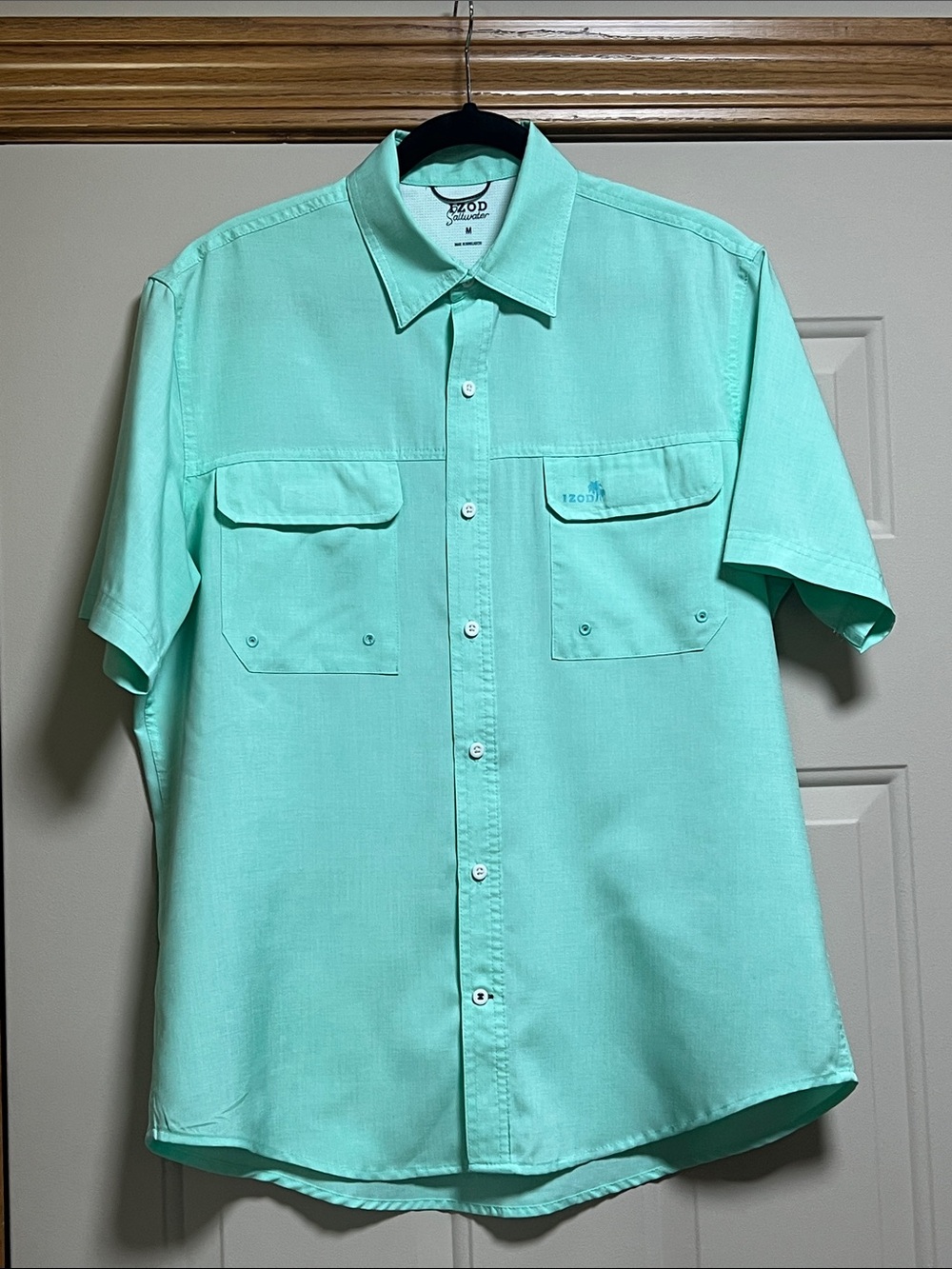 IZOD Saltwater lime green short sleeve shirt.
